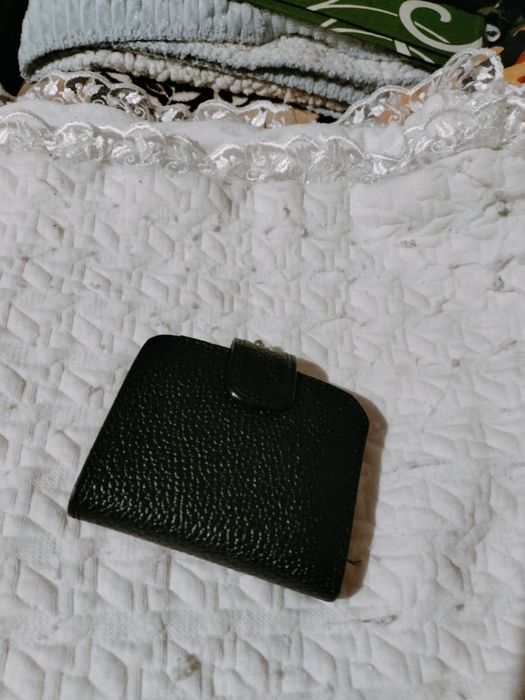 Гаманці та клатчі