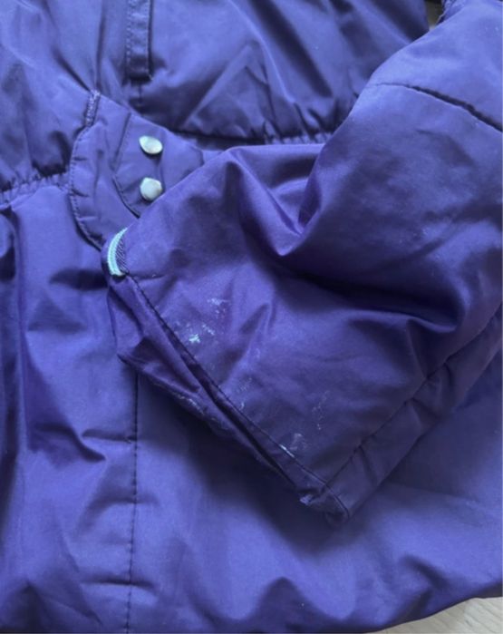 kurtka z ćwiekami i futrzanym kapturem