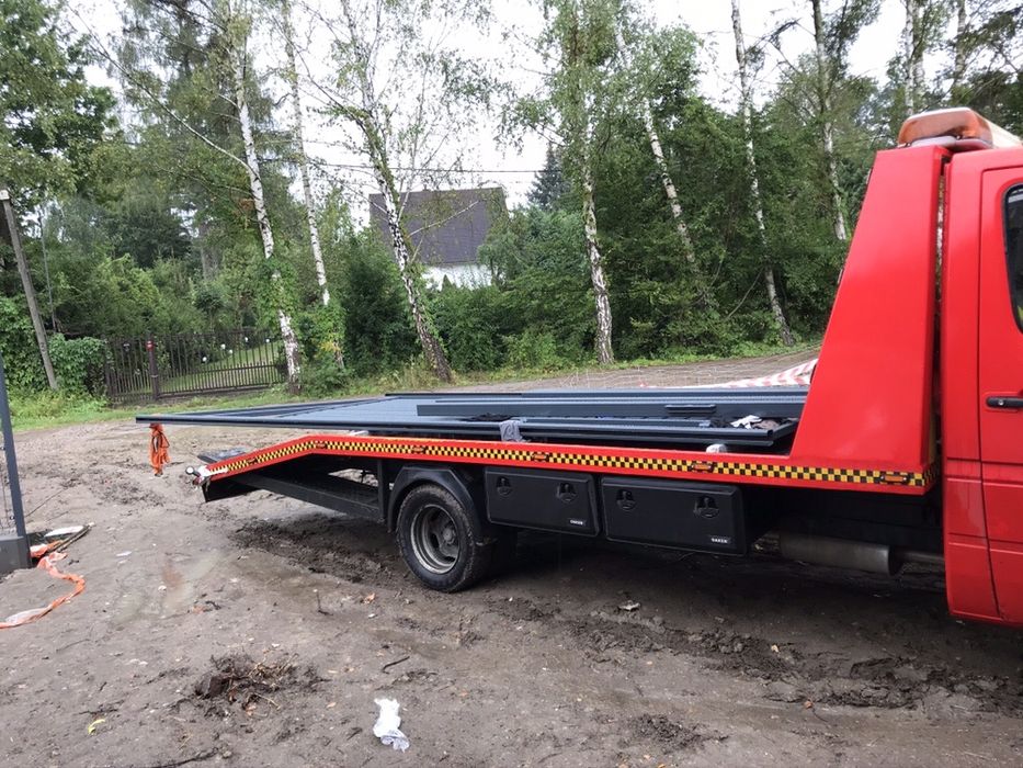 POMOC DROGOWA  laweta holownik mokotow ursynow odpalanie przewozy A2