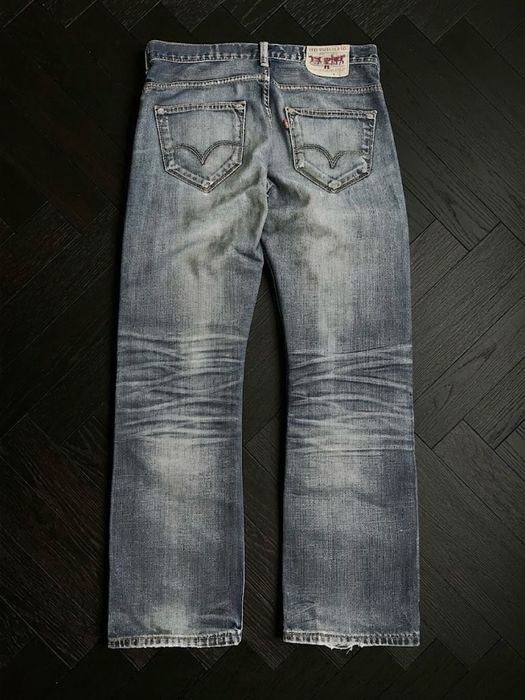 Джинсы Levis bootcut 512 527 faded distressed washed jeans