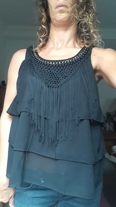 Top preto, Louis Six