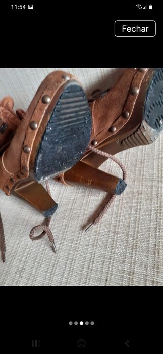 Botas castanhas bom estado  marca tapadas