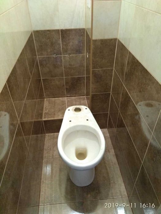 Укладка кафельной плитки Стены Пол.