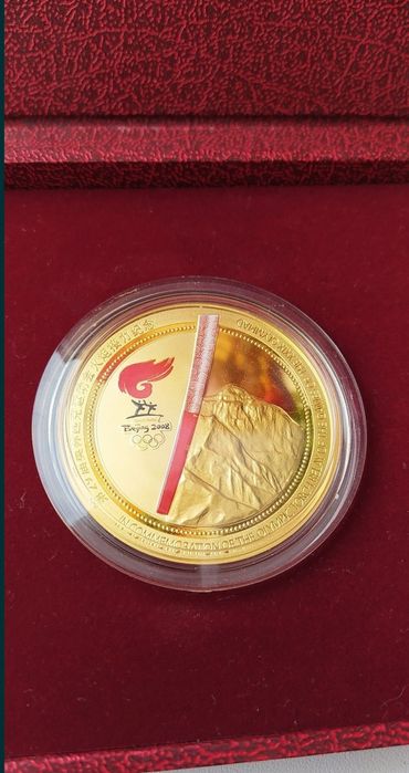 Настільна медаль 2008 року  . В честь запалення Олімпійського вогню.