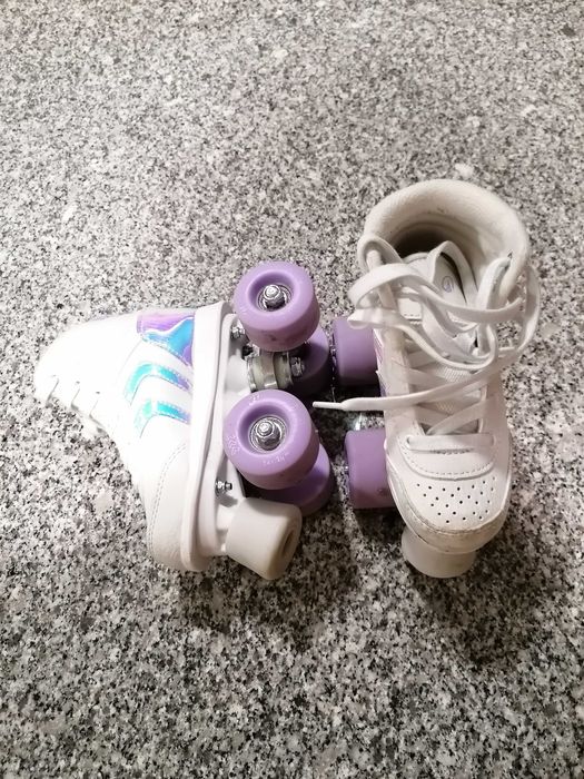 Patins 4 rodas e travões semi novos ( talao de compra de 18/12/25)