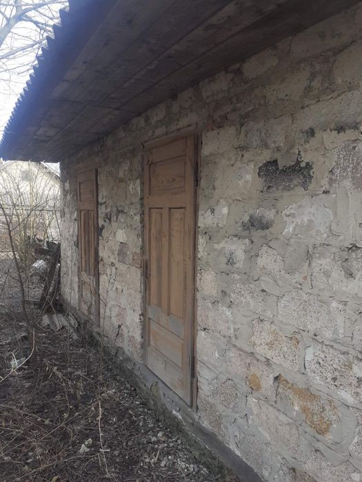 Продам земельну ділянку з будинком
