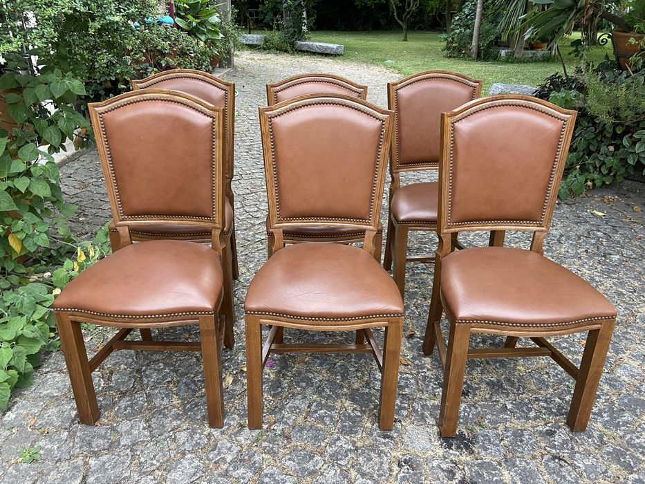 Cadeiras em pele sala de jantar