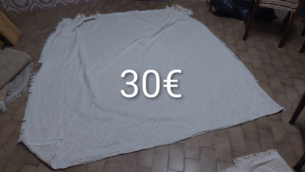 Carpetes / mantas / edredões