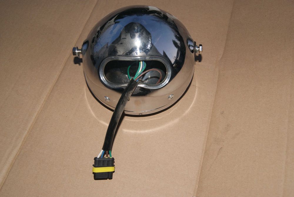 Retro reflektor GN125 motocykl