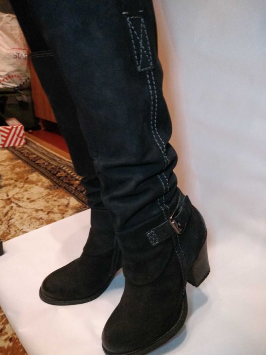 Изящные осенние сапоги для стильной и уверенной в себе женщины