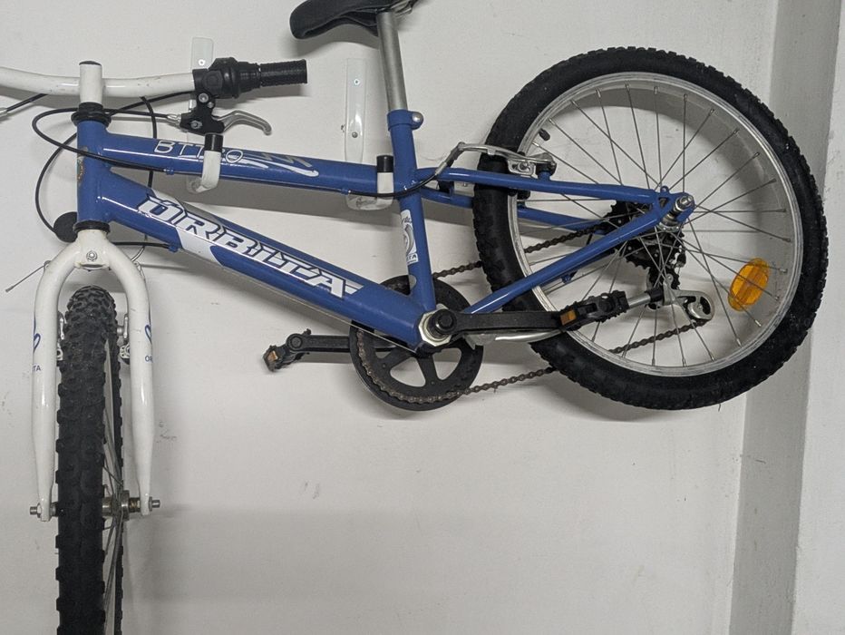 Bicicleta de criança orbita
