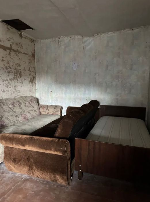 Будинок смт.Ріпки на березі річки