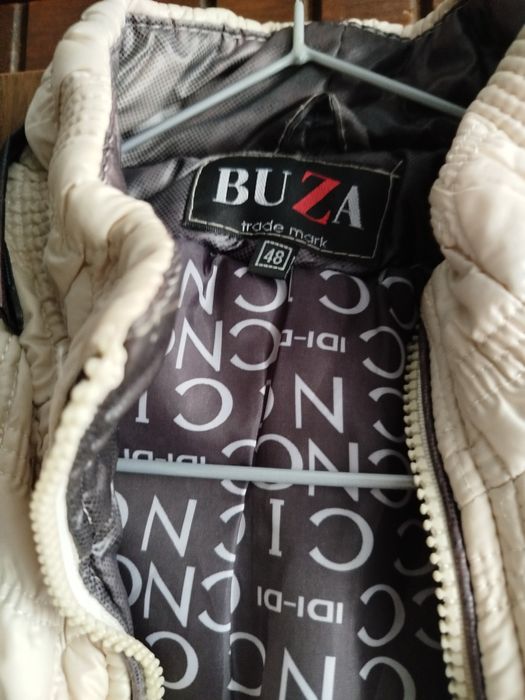 Жіночі теплі жилети б/у