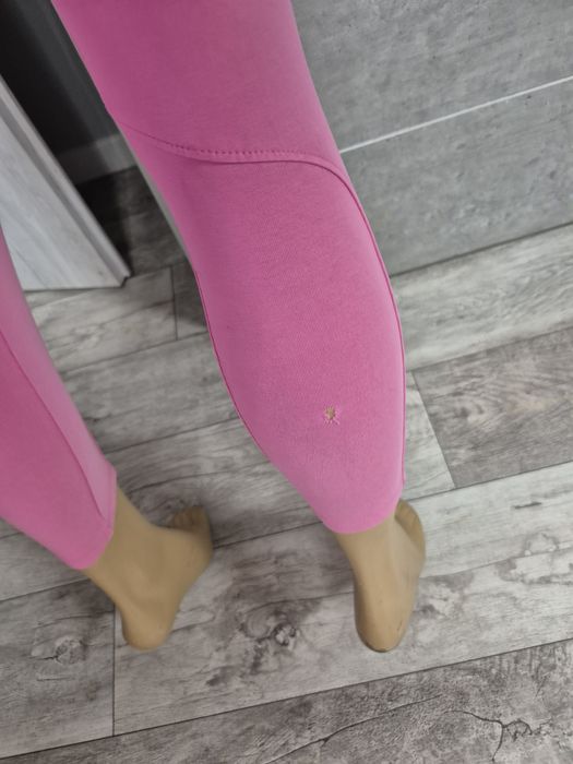 Leginsy różowe Nike rozm L