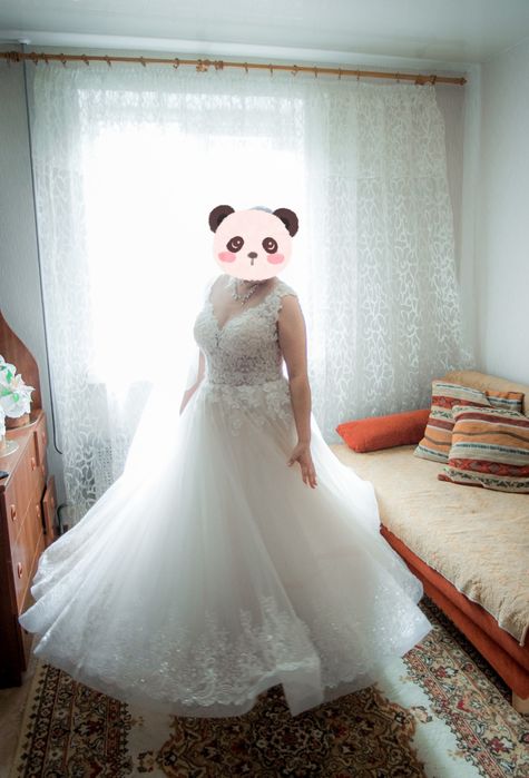 Вишукана весільна сукня