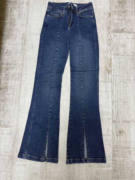 Джинси кльош 38 розмір