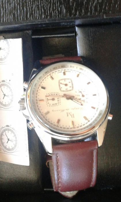 Relógio marca P de M