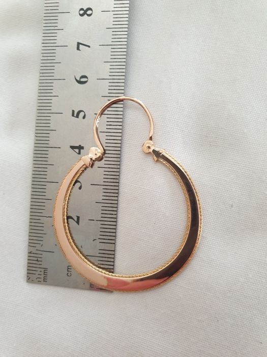 Argolas de ouro grandes