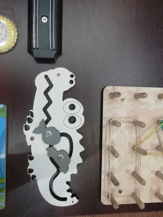 Tablica sensoryczna, manipulacyjna, motoryka, rozwija rączki, jak nowa
