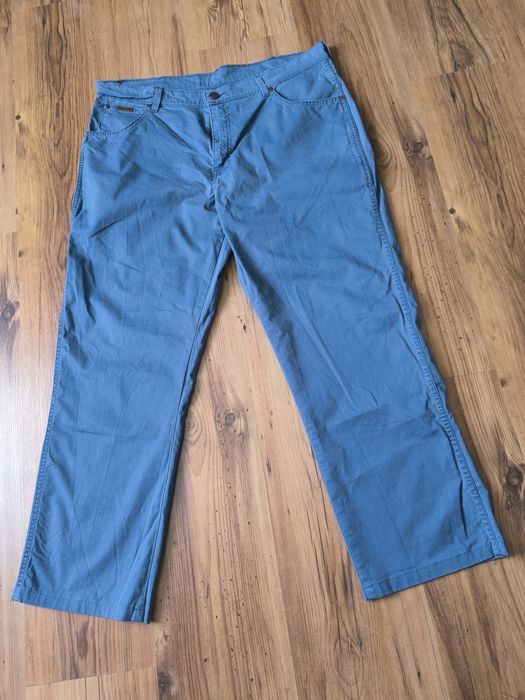 Wrangler Texas Stretch W38 L34 niebieskie lekkie proste
