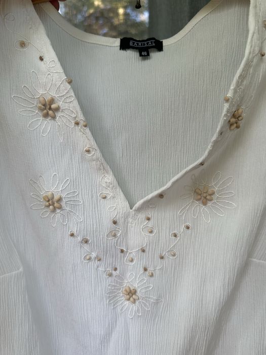 Piękna i elegancka kremowa bluzka rozm.L