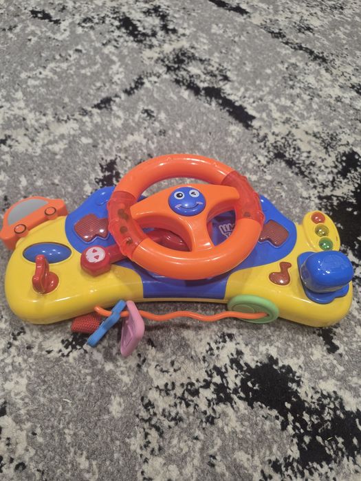 Іграшка на коляску