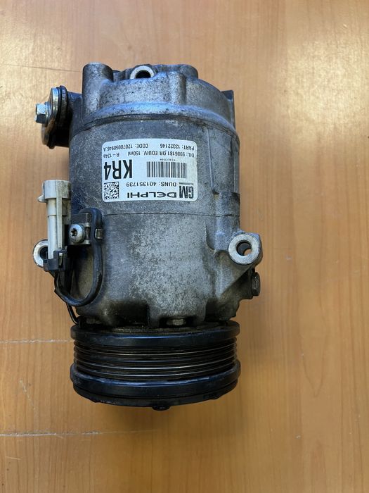 Компресор кондиціонера  Опель Астра Н