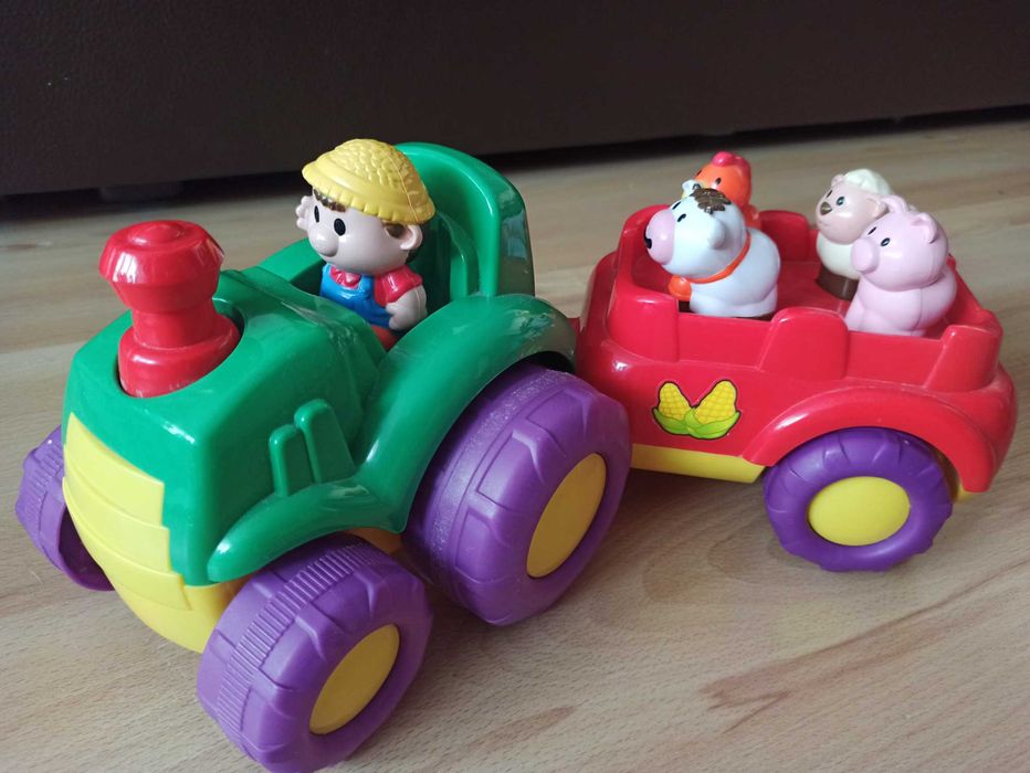 Pan Dumelek traktorek grający farmer