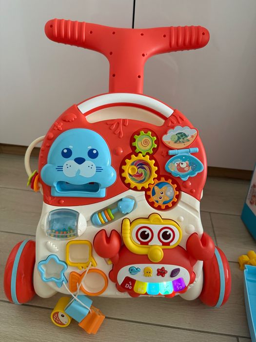 Дитячі ходунки каталка столик