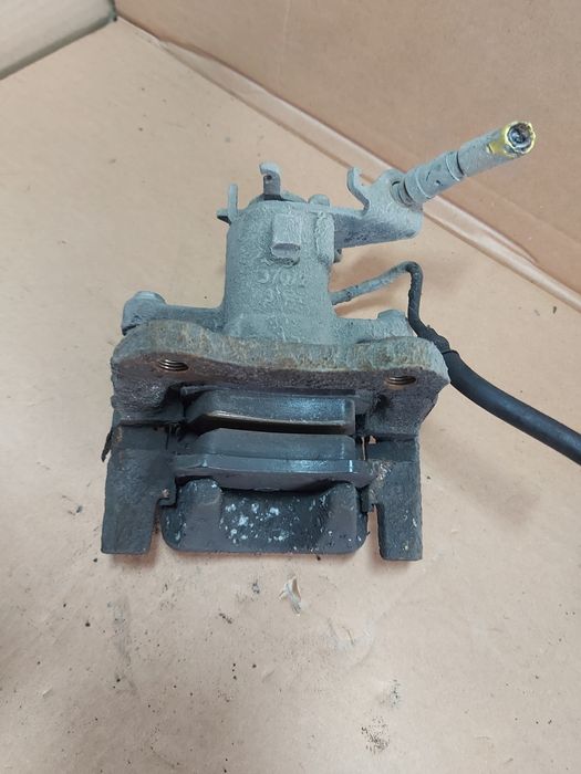 / Megane III 3 zacisk hamulcowy lewy tył