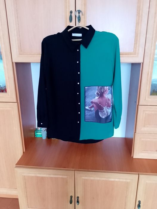 Блуза , дуже гарна,в ідеальному стані,на вигляд як нова.