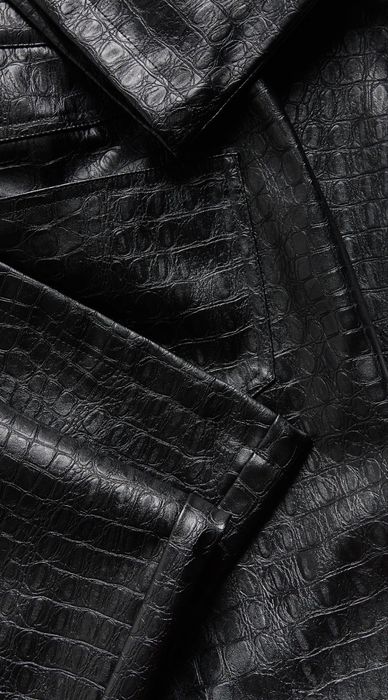 Штани -кльош зі штучної шкіри