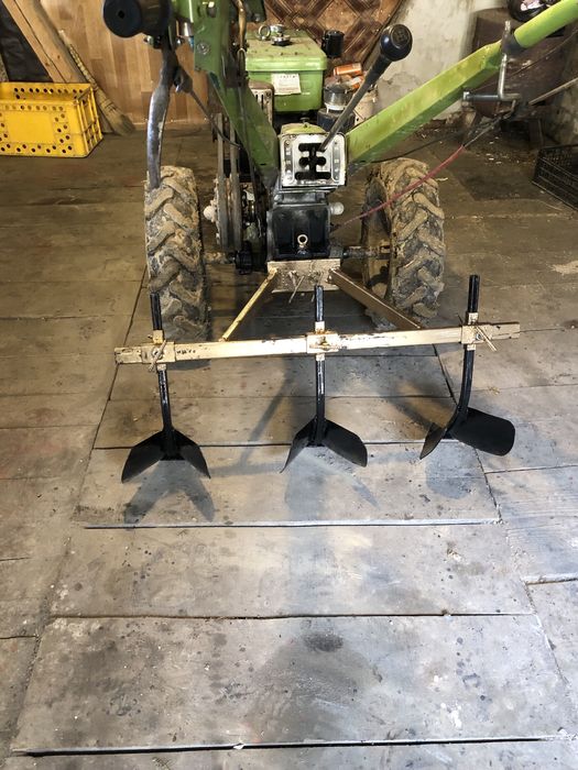 Плуги (марка) до мотоблока