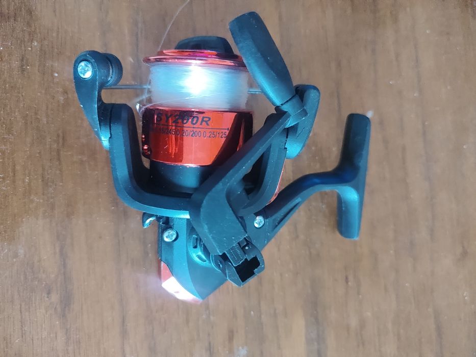 Катушка для удочки новая с леской и складной ручкой