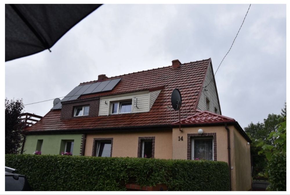 Połowka domu z ogrodem