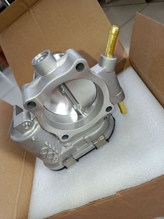 Дросельна заслінка на каптіву Шевроле 2,4 бензин