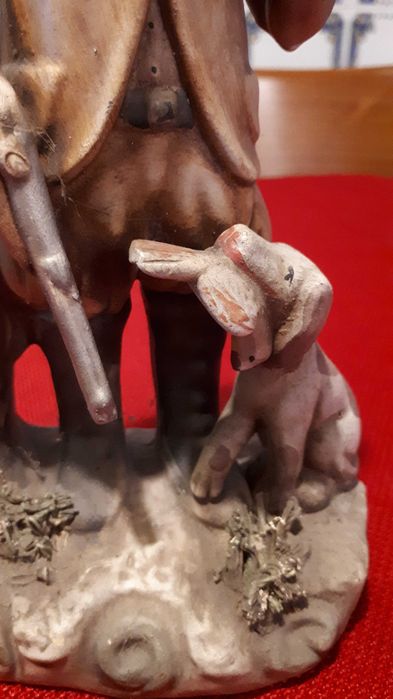 Boneco caçador em louça