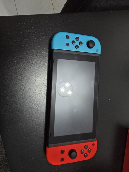 Nintendo switch v2 (comando azul estragado)