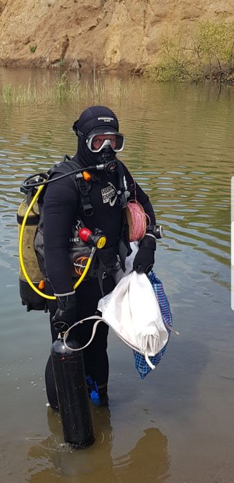 Водолаз дайвер ныряльщик аквалонгист.