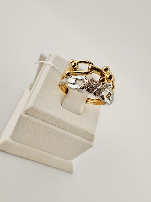 Золоті каблучки нові