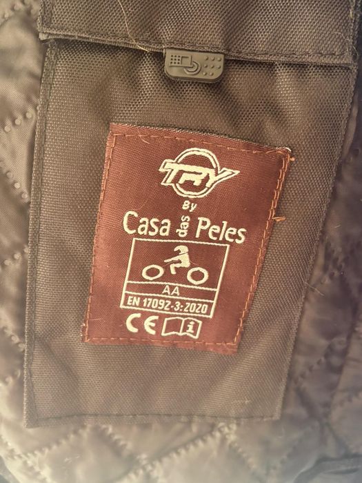 Casaco mota pele