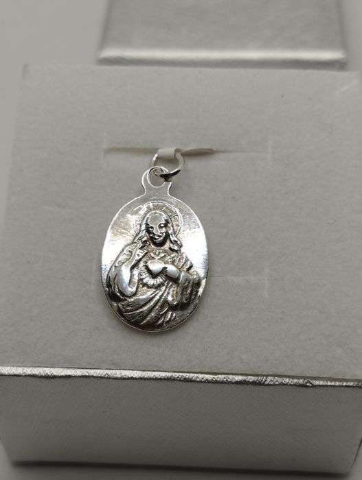 Srebrny dwustronny medalik, próba 830