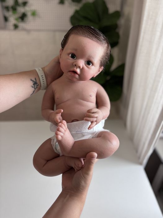 Boneca reborn silicone sólido menino