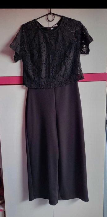 Elegancki czarny kombinezon 36