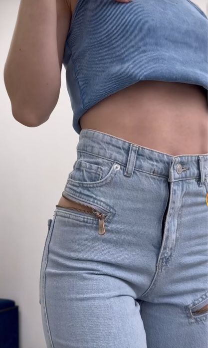 Джинси сині із замочками кльош труби дешево