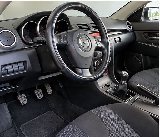 Mazda 3 1.6 MZ-CD Exclusive — photo 4