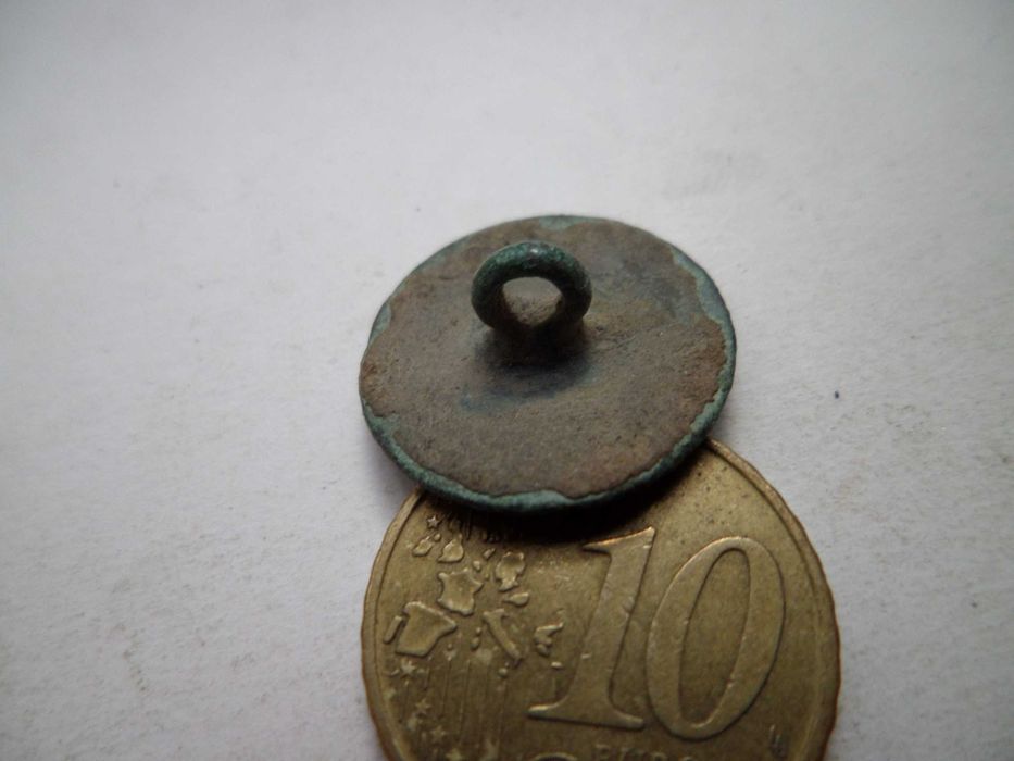 Botão antigo em Metal