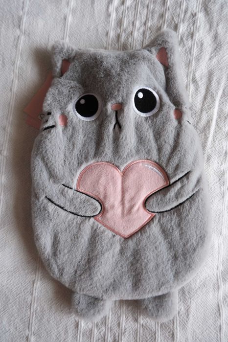 Termofor Smukee Home 1.2L kot, miły w dotyku