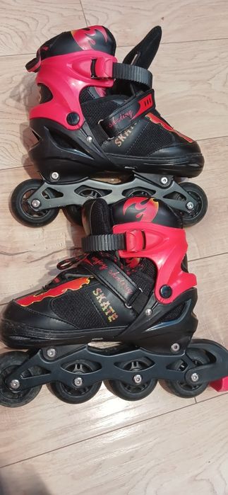 Дитячі яскраві майже нові ролики рр 35 38,