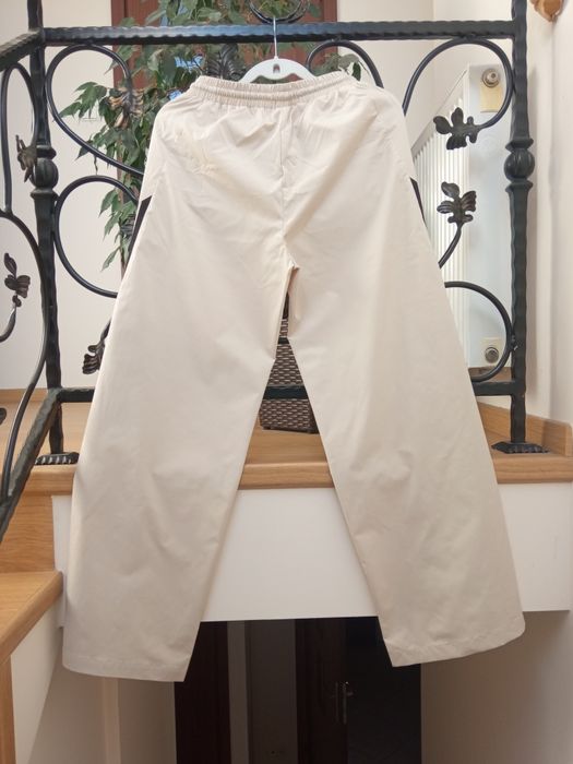 Bezowe spodnie straight Cropp rozm.34